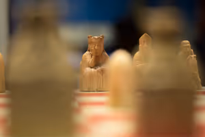 **Lewis chessman**

[Source](https://commons.wikimedia.org/wiki/File:British_Museum_-_Room_40_Lewis_Chess_Pieces_(20223863409).jpg)