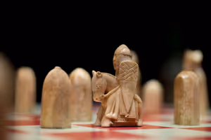 **Lewis chessman**

[Source](https://commons.wikimedia.org/wiki/File:British_Museum_-_Room_40_Lewis_Chess_Pieces_(20223865099).jpg)