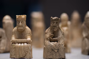 **Lewis chessman**

[Source](https://commons.wikimedia.org/wiki/File:British_Museum_-_Room_40_Lewis_Chess_Pieces_(20416690091).jpg)