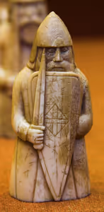 **Lewis chessman**

One of the Lewis chessmen. This is a cropped version of File:Lewis Chessman, British Museum.jpg.
[Source](https://commons.wikimedia.org/wiki/File:Lewis_Chessman,_British_Museum_(crop).jpg)