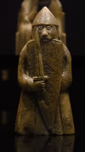 **Lewis chessman**

Exhibition in the National Museum of Scotland. Pieces from the British Museum, National Museum of Scotland and other collections. A warder (rook) with number of permanent collection NMS 29
[Source](https://commons.wikimedia.org/wiki/File:Lewis_chessmen_01.JPG)