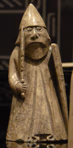 **Lewis chessman**

One of the Lewis chessmen. This image is a cropped version of: File:Lewis chessmen 15.JPG.
[Source](https://commons.wikimedia.org/wiki/File:Lewis_chessmen_15_(crop).jpg)